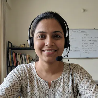 Priya S., an online English teacher working from India with a headset